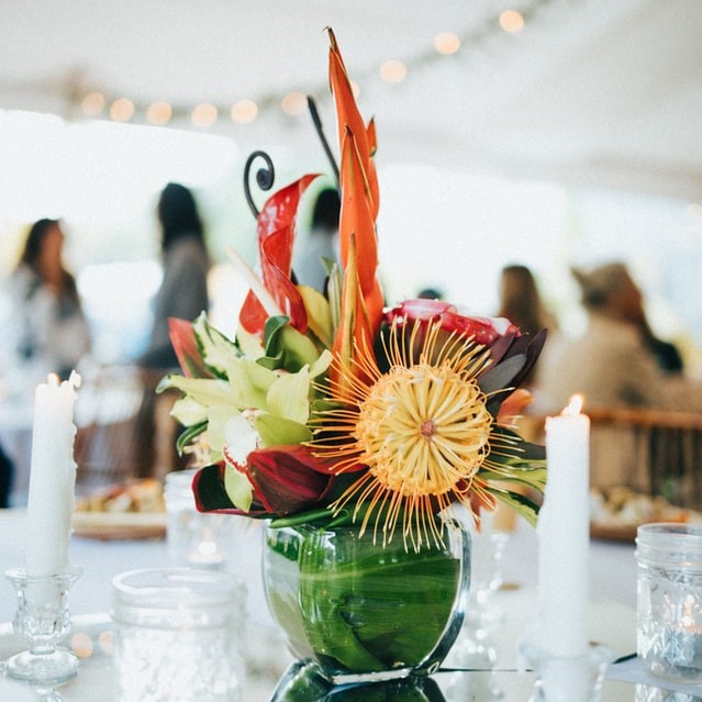 four flower bouquets on table