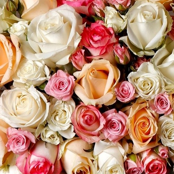 four flower bouquets on table